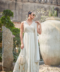 Adara Ivory Suede Potli With Pearl Gold Hanging