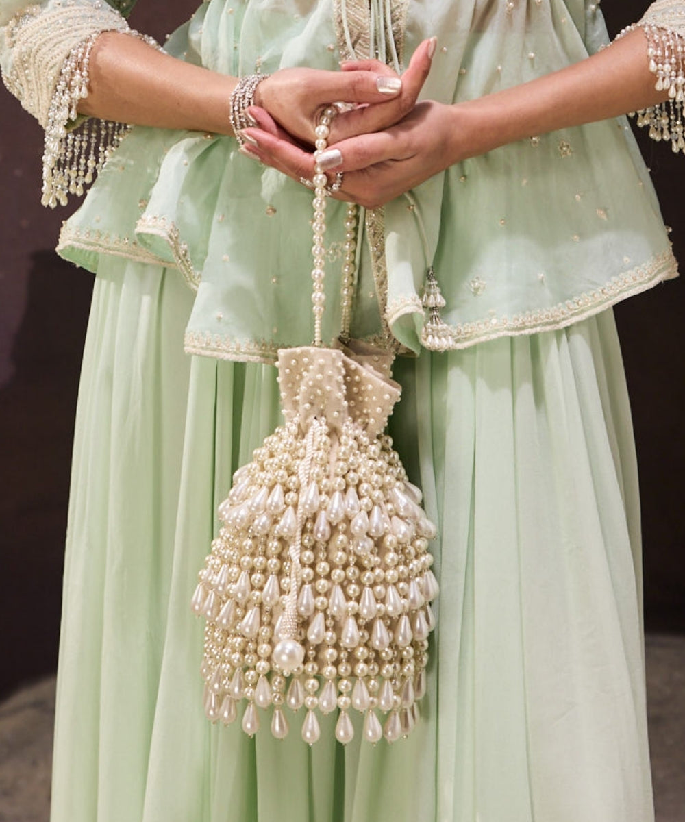 Zarah Ivory Pearl Suede Bucket Bag - House of Kosha